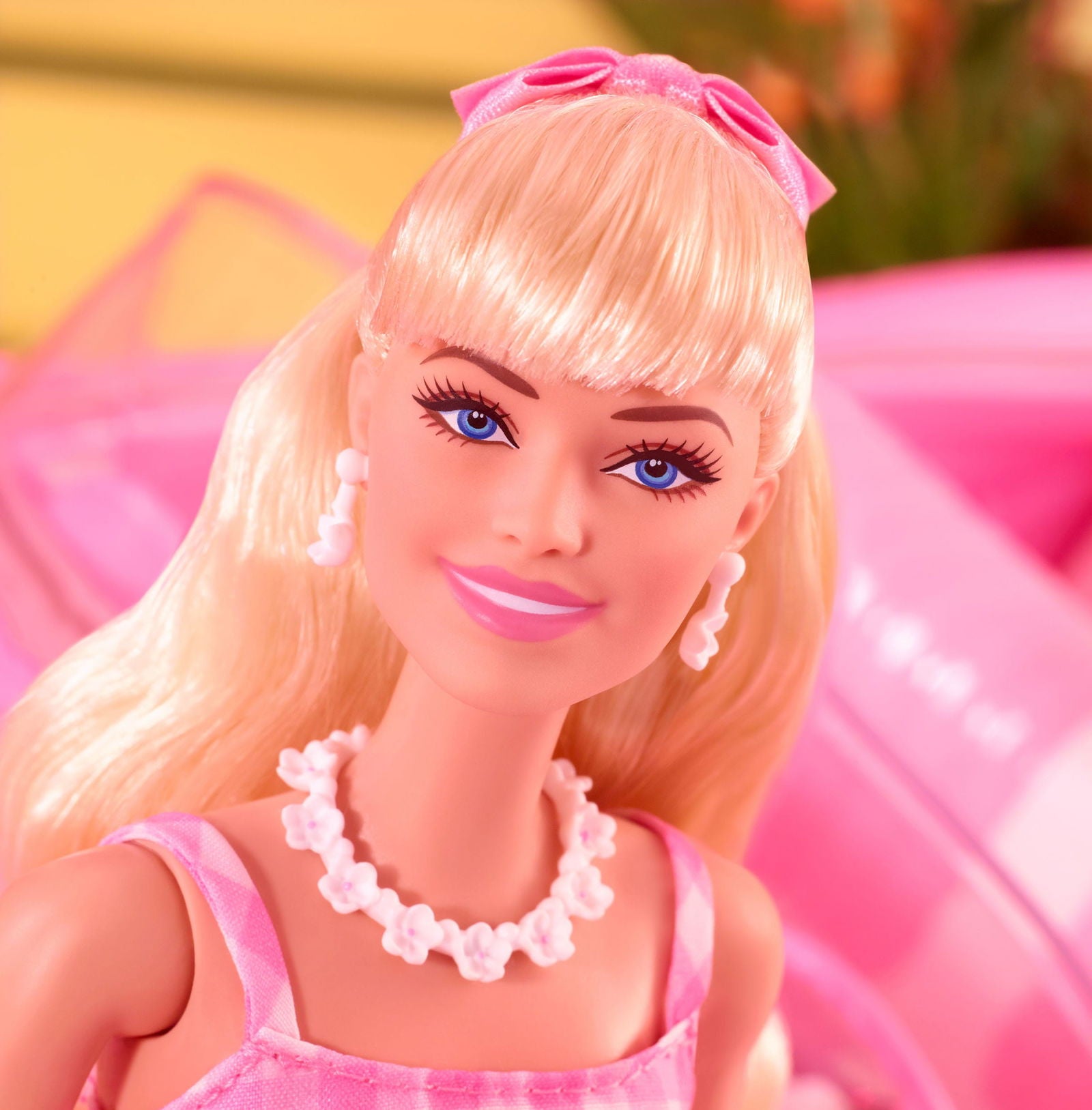 Margot Robbie as Barbie in a Charming Pink Gingham Dress from Barbie The Movie