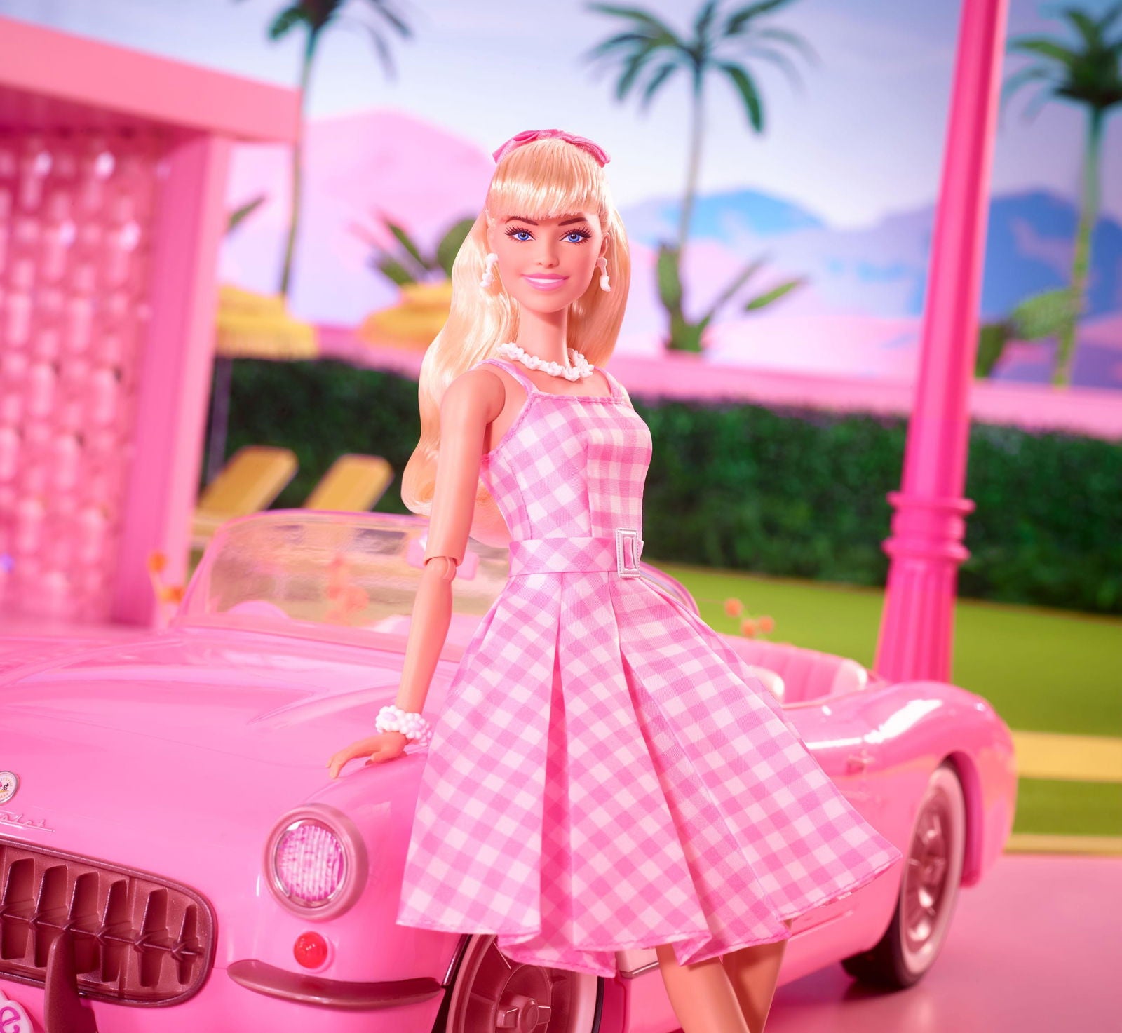 Margot Robbie as Barbie in a Charming Pink Gingham Dress from Barbie The Movie