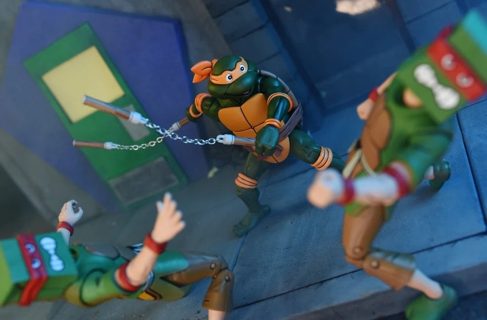 NECA Ultimate 7-Inch Action Figure of Teenage Mutant Ninja Turtles Cartoon Character Michaelangelo in VHS Style Packaging