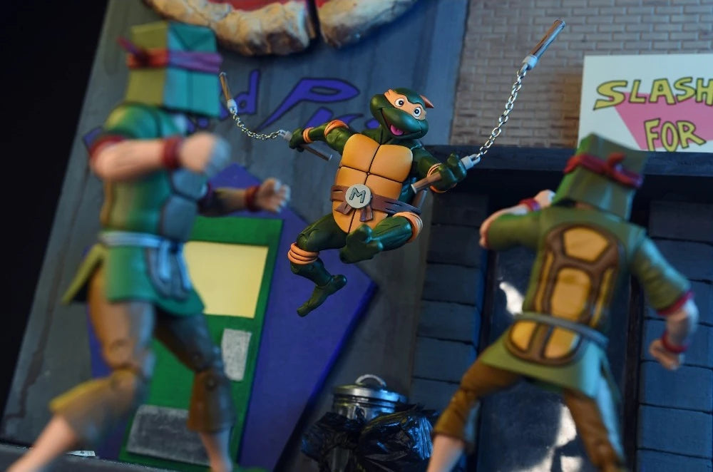 NECA Ultimate 7-Inch Action Figure of Teenage Mutant Ninja Turtles Cartoon Character Michaelangelo in VHS Style Packaging