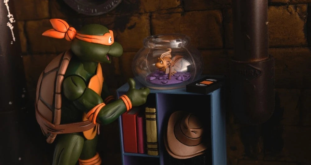 NECA Ultimate 7-Inch Action Figure of Teenage Mutant Ninja Turtles Cartoon Character Michaelangelo in VHS Style Packaging