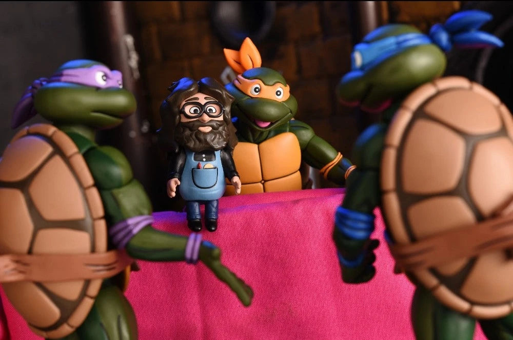 NECA Ultimate 7-Inch Action Figure of Teenage Mutant Ninja Turtles Cartoon Character Michaelangelo in VHS Style Packaging