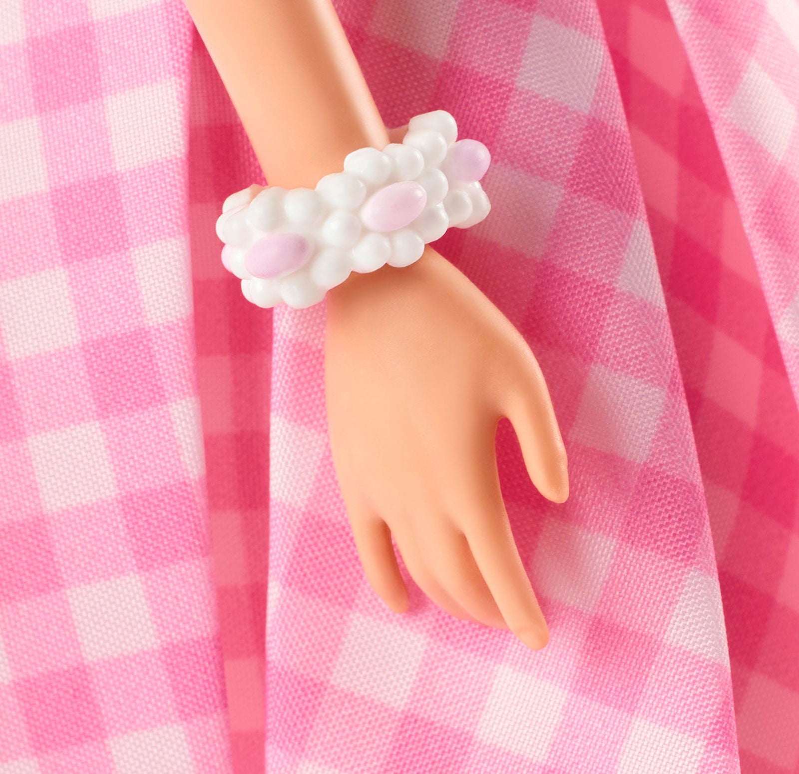Margot Robbie as Barbie in a Charming Pink Gingham Dress from Barbie The Movie